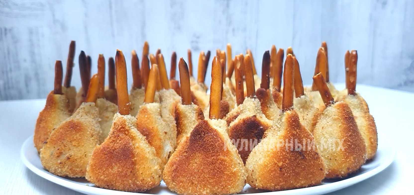 Image du plat : Triangles de poulet sur des pailles croustillantes