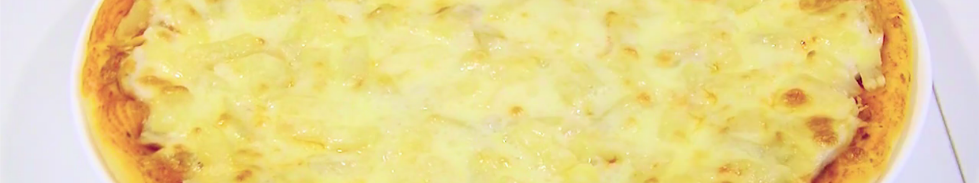 Pizza à l'ananas et au poulet