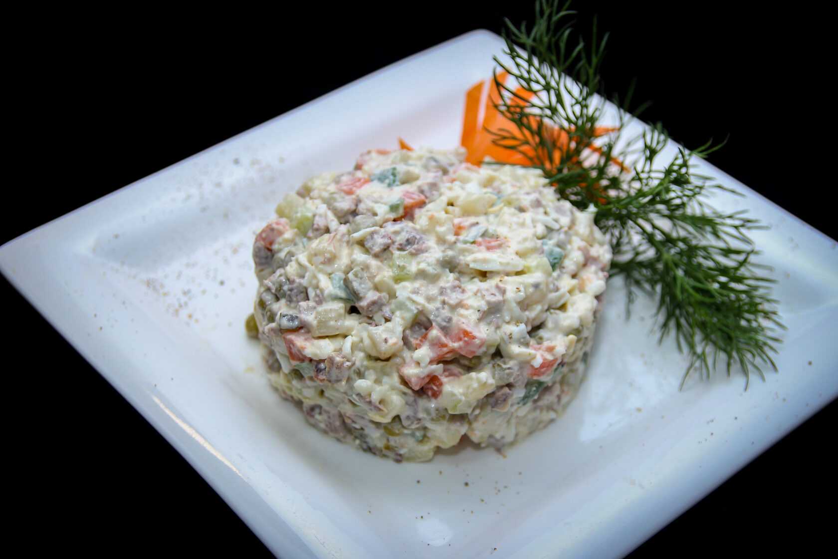 Salade Olivier à la langue de porc - Étape 9