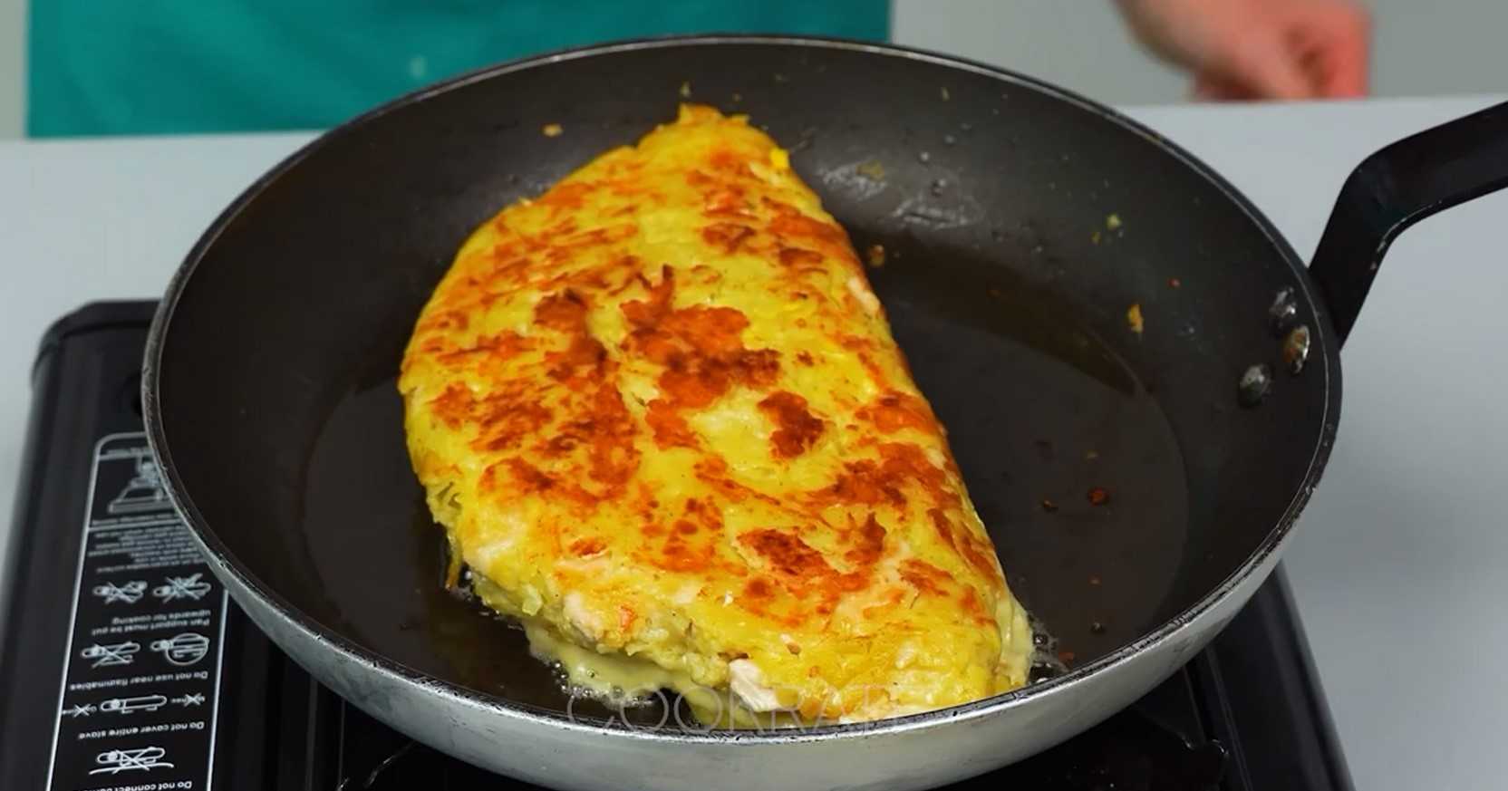 Image du plat : Gratin de pommes de terre au poulet dans une poêle